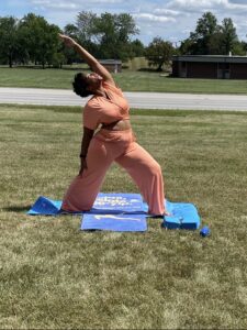 Tasha doing yoga outdoors